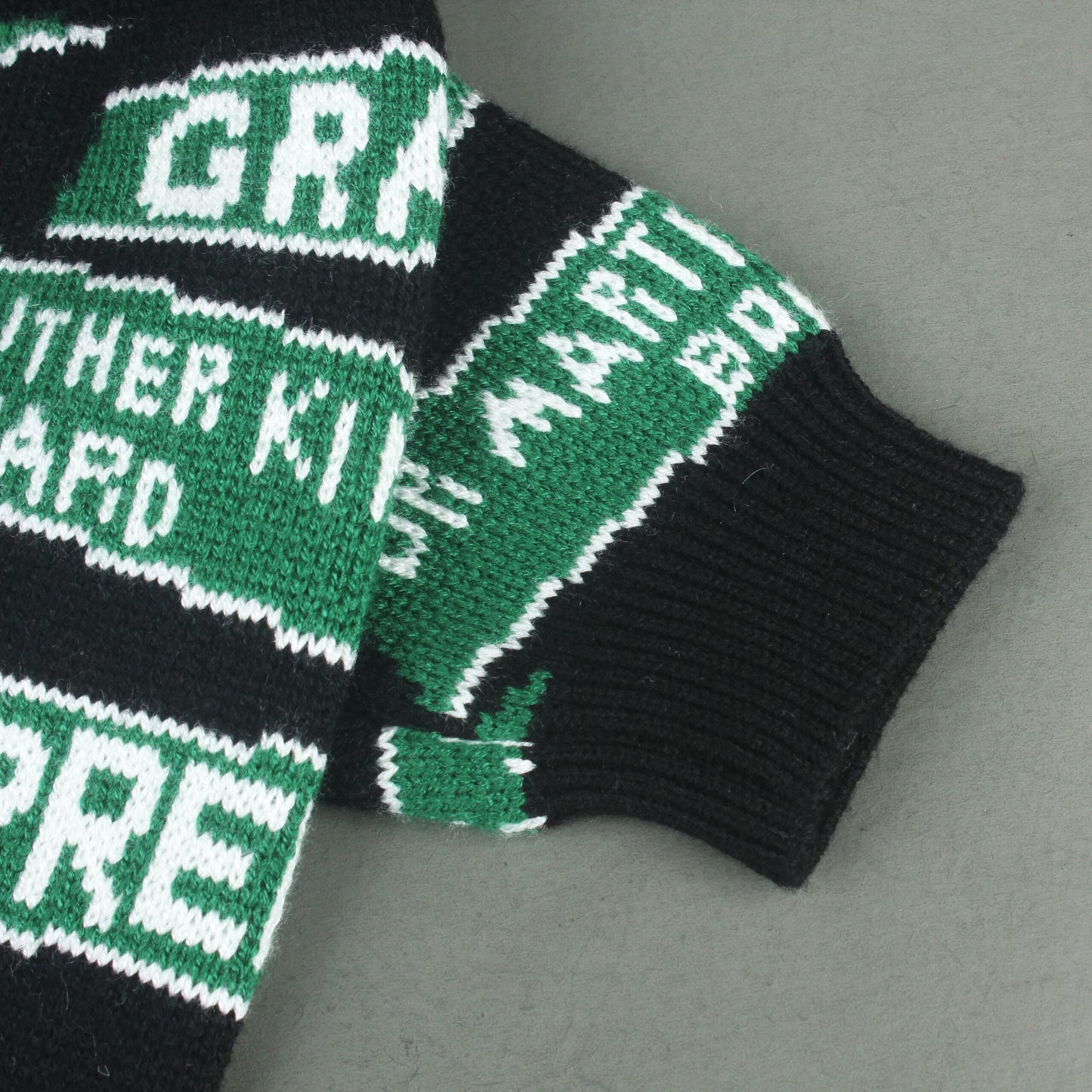 Pupreme Black and Green Sweater